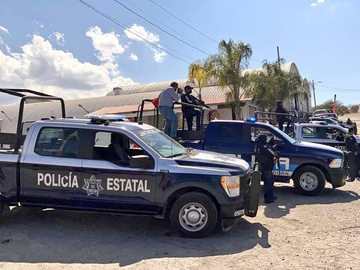 Elementos de la policía tras la balacera. Foto: Periodico AM.