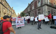 Defraudados por financiera protestan en Palacio Nacional