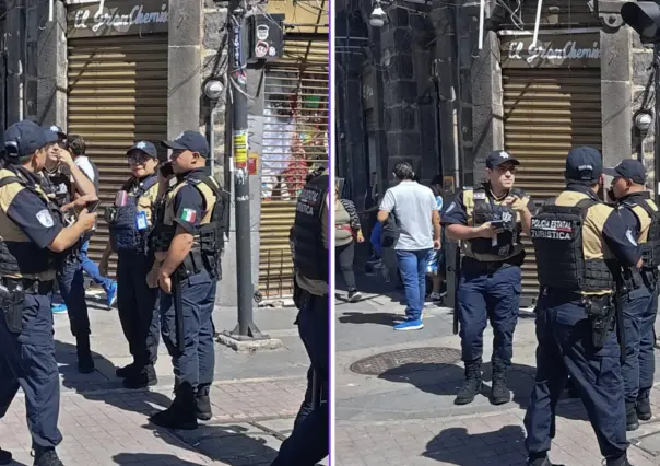 Comerciantes se enfrentan con policías en centro de Puebla; hay 3 lesionados