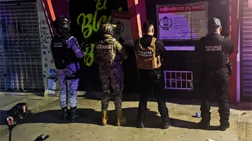 Rescatan a 14 mujeres en cateo a bar de Cancún; hay un detenido por presunta trata de personas Rescatan a 14 mujeres en cateo a bar de Cancún; hay un detenido por presunta trata de personas